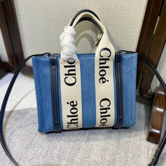 SMALL STRAP WOODY TOTE BAG 26.5 IN BLUE DENIM CANVAS DARK BLUE CALFSKIN