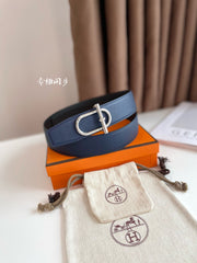 HM ITHAQUE BELT SILVER BUCKLE & REVERSIBLE NAVY BLUE AND BLACK LEATHER STRAP 38MM