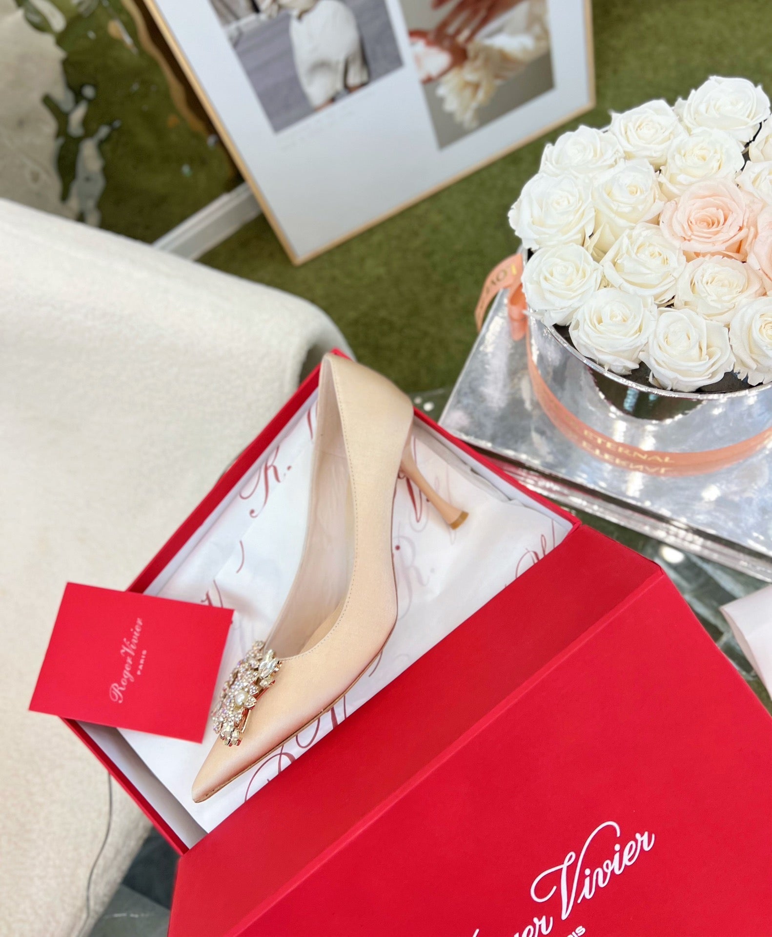 EFFLORESCENCE POINTED-TOE PUMPS IN NUDE SATIN WITH CRYSTAL BUCKLE