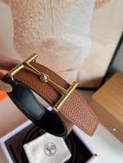 HM JUMBO BELT BUCKLE & REVERSIBLE CIDER ORANGE AND BLACK LEATHER STRAP 38 MM GOLD HARDWARE