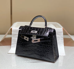 HERMES 25S MINI KELLY 19 IN BLACK CALFSKIN SILVER HARDWARE