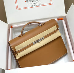 KELLY DEPECHES 38 BRIEFCASE IN GOLD TOGO CALFSKIN SILVER HARDWARE