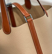 HERMES 25S PICOTIN LOCK 18 IN BURNT ORANGE AND LIGHT BROWN CALFSKIN SILVER HARDWARE