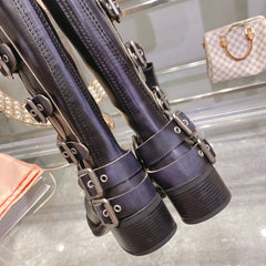 THICK-SOLED BUCKLE BOOTS IN BLACK CALFSKIN