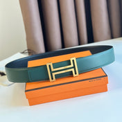 HM  BELT BUCKLE & REVERSIBLE TEAL GREEN AND BLACK LEATHER STRAP 38MM GOLD HARDWARE