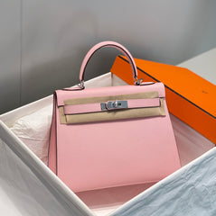 KELLY 28CM IN ROSE SAKURA SWIFT CALFSKIN SILVER HARDWARE