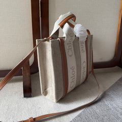 SMALL WOODY TOTE BAG 26.5 IN BEIGE LINEN CANVAS WEBBING LOGO EMBROIDERY BROWN CALFSKIN