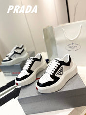 PRA DOWNTOWN THICK-SOLE SNEAKERS BLACK AND WHITE CALFSKIN