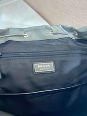 TRIANGLE LOGO BACKPACK 45 IN ASH GRAY RE-NYLON