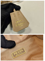 BUCKET BAG 19 IN BEIGE RE-NYLON AND SAFFIANO LEATHER HANDLE