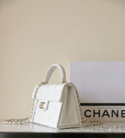 CHANEL 25S FLAP BAG 21 CM IN WHITE LAMBSKIN WITH GOLD HARDWARE
