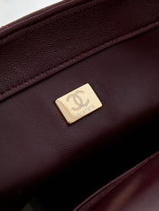 FLAP BAG WITH TOP HANDLE 25 IN WINE RED OIL-WAX LAMBSKIN GOLD HARDWARE