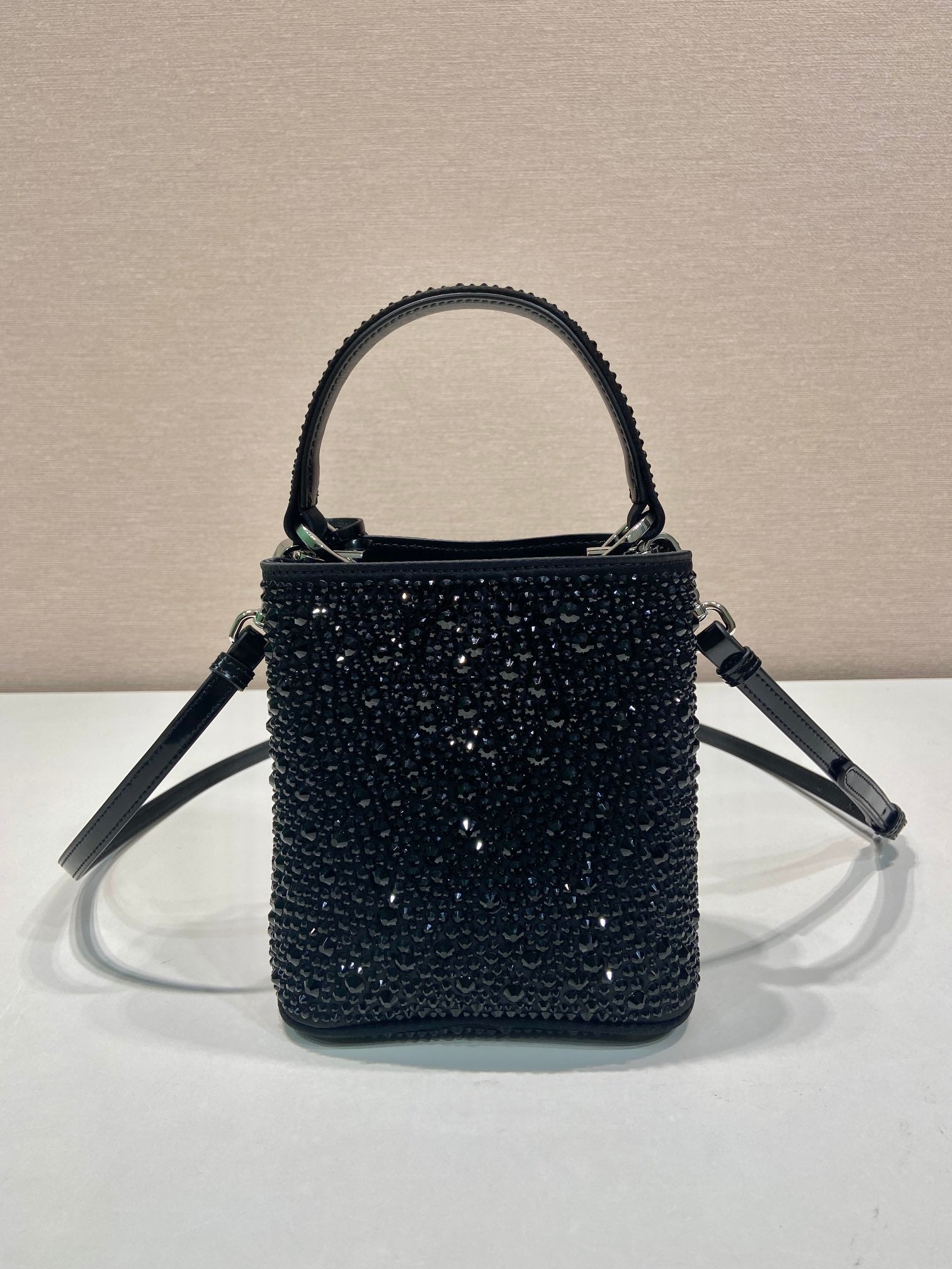 PANIER BUCKET BAG 16 IN BLACK CALFSKIN ATTACHED FULL CRYSTALS