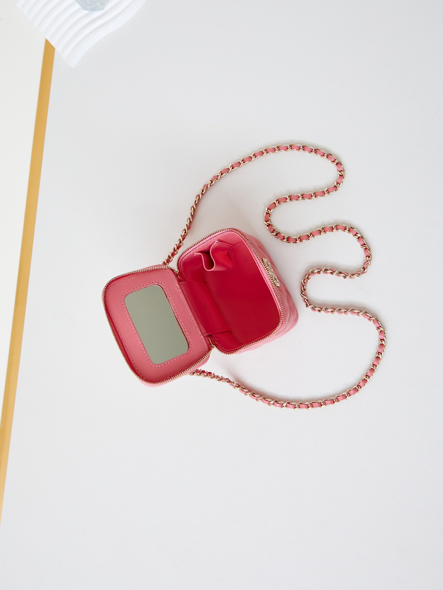 CHANEL 25S MINI VANITY BAG 11 CM IN PEACH PINK LAMBSKIN WITH CRYSTAL-EMBELLISHED CC LOGO