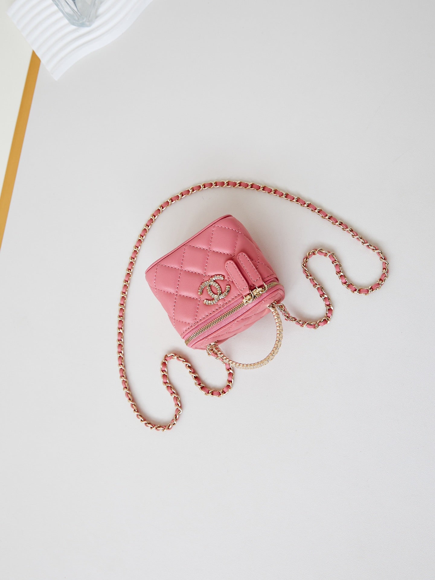 CHANEL 25S MINI VANITY BAG 11 CM IN PEACH PINK LAMBSKIN WITH CRYSTAL-EMBELLISHED CC LOGO