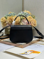 SMALL 19 MONTAIGNE AVENUE TOP HANDLE BAG BLACK SMOOTH CALFSKIN