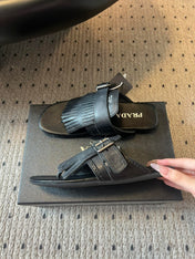 PRADA 25S SHUFFLE LEATHER THONG SANDALS IN BLACK CALFSKIN