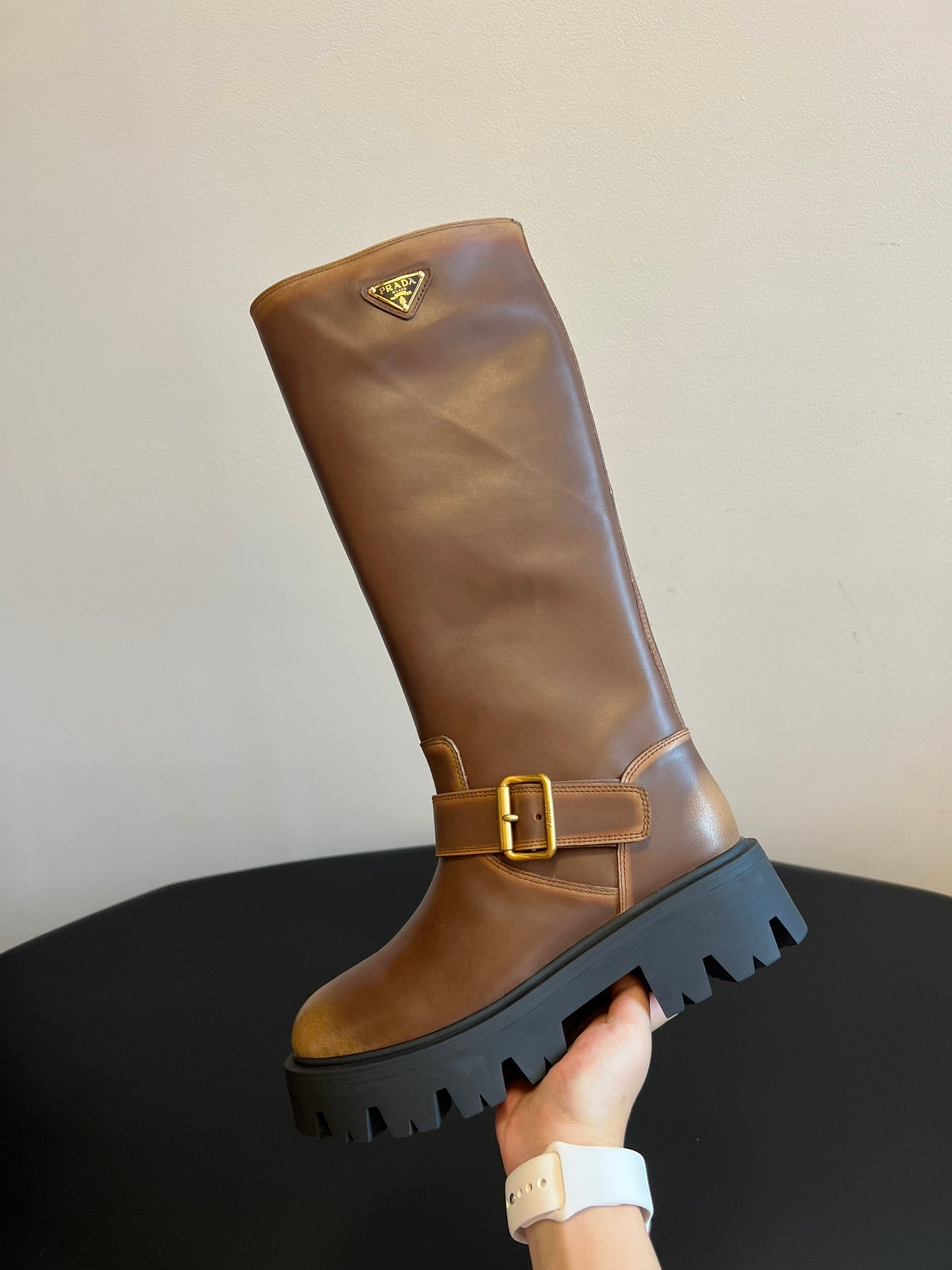 PRADA 25S HIGH-CUT PLATFORM BOOTS IN BROWN CALFSKIN WITH GOLD HARDWARE
