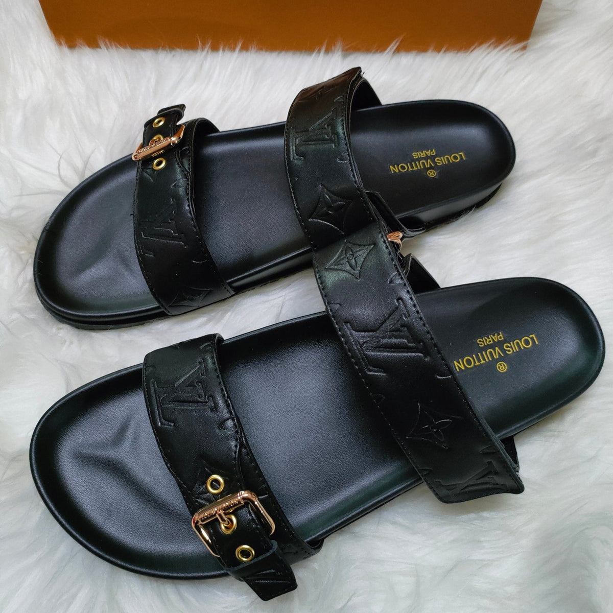 LV LOCK IT SANDALS IN BLACK EMBOSSED CALFSKIN