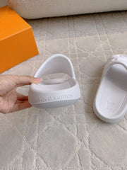 LV EMBOSSED POOL PILLOW SANDALS IN WHITE RUBBER