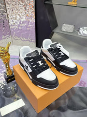 LV TRAINER SNEAKERS IN BLACK AND WHITE CALFSKIN