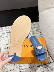 LV FLAT MULES BLUE IN BLUE DENIM GOLD-TONE PLAQUE