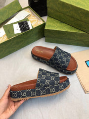 GG THICK PLATFORM SLIDES IN BLUE MONOGRAM EMBOSSED FABRIC