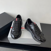 PRADA SNEAKER 25S IN BLACK MESH AND PATENT CALFSKIN