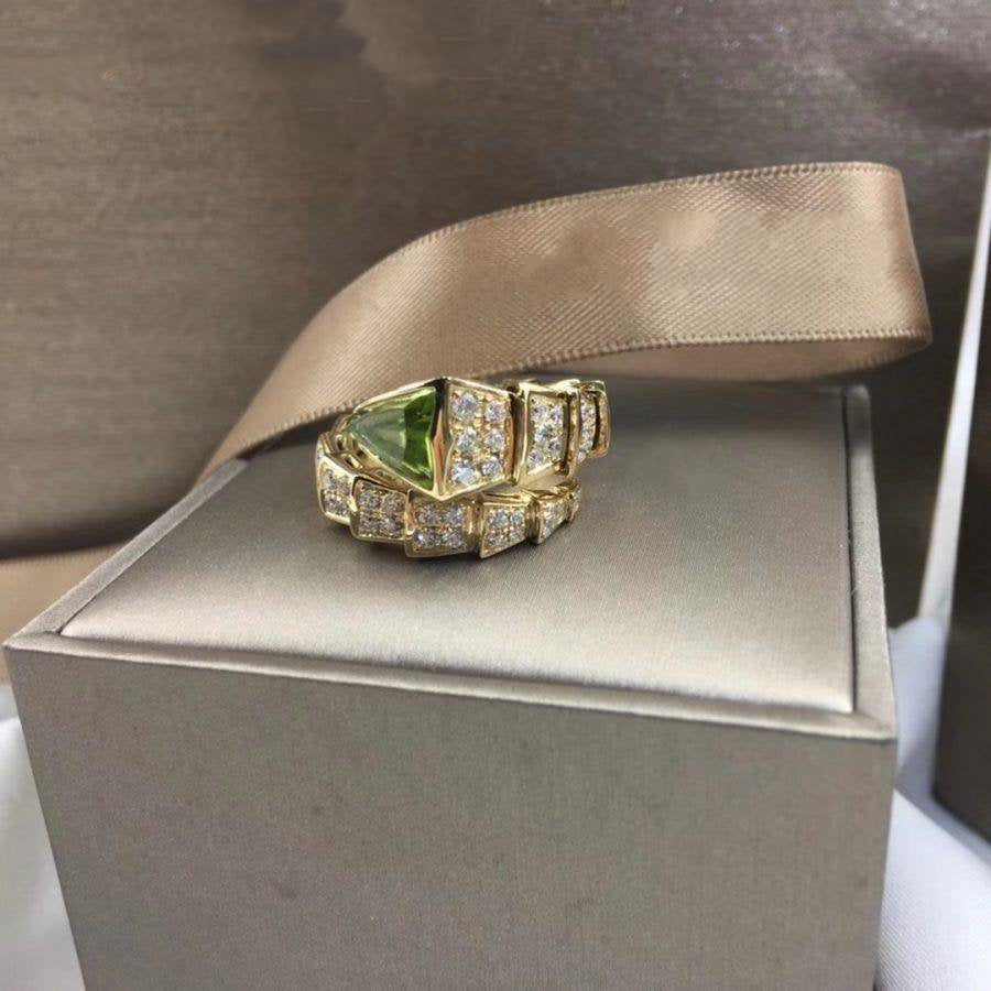 bulgari-serpenti-viper-one-coil-ring-in-18-kt-yellow-gold-set-with-peridot-elements_4a80552c-54db-4dab-9a55-64874dfe0977.jpg