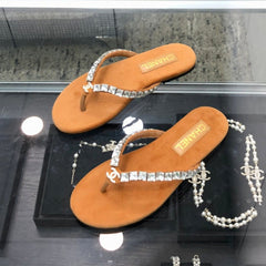 THONG SLIDE IN BRONZE BROWN SUEDE WITH WHITE CRYSTALS