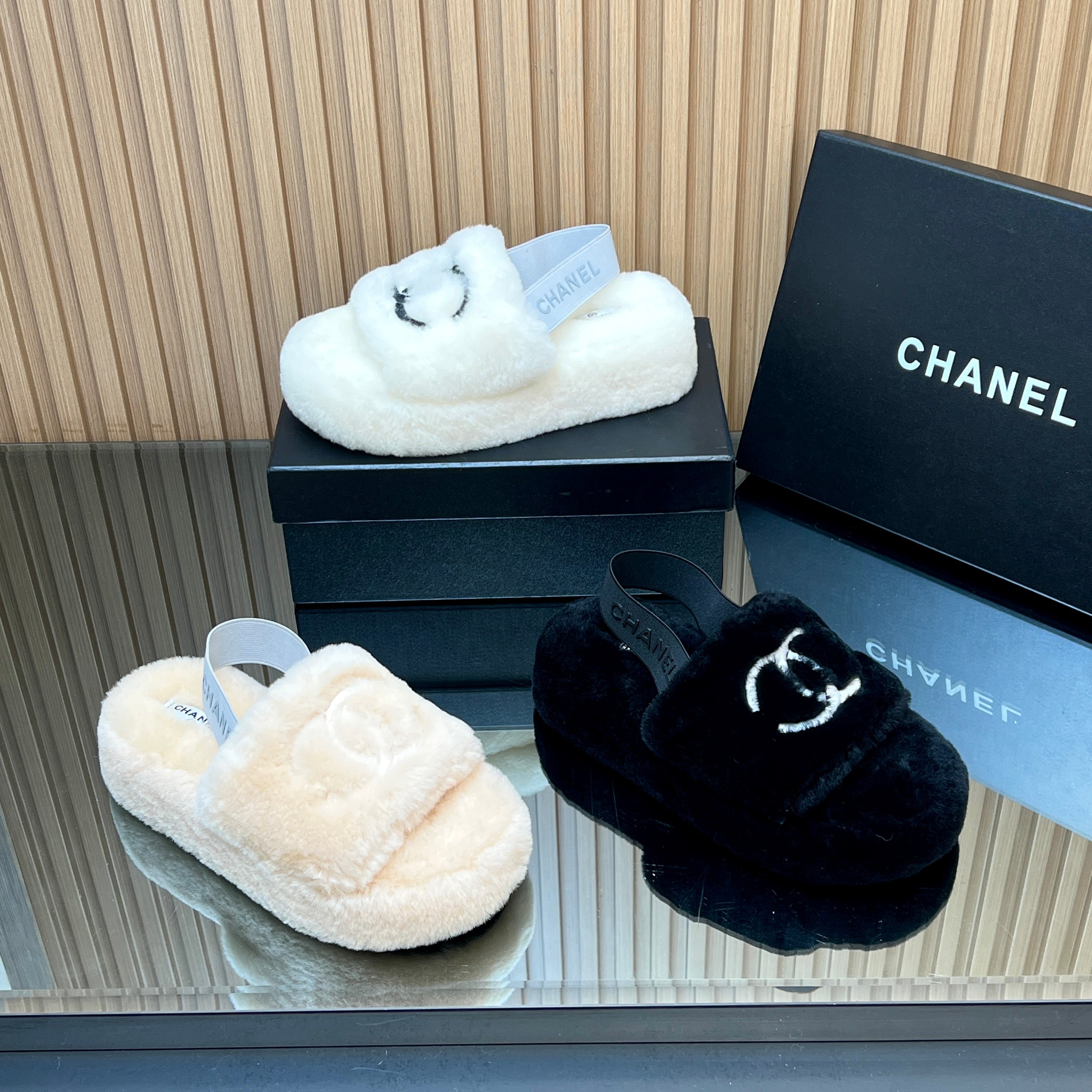CHANEL 25S THICK-SOLED FURRY SLIPPERS WITH ELASTIC STRAPS IN BEIGE FUR