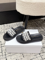 DIOR SLIDES 25S IN BLACK LAMBSKIN AND FABIRC WITH BRAND LOGO STYLE 3