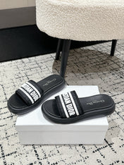 DIOR SLIDES 25S IN BLACK LAMBSKIN AND FABIRC WITH BRAND LOGO STYLE 1