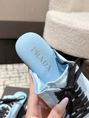 PRADA 25S DEXUN MULE IN LIGHT BLUE SUEDE LEATHER