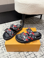 LV TWO-STRAP SLIDES 25S IN BLACK FABRIC AND CALFSKIN