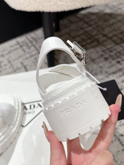 PRADA 25S CRISSCROSS SANDALS IN WHITE CALFSKIN LOGO
