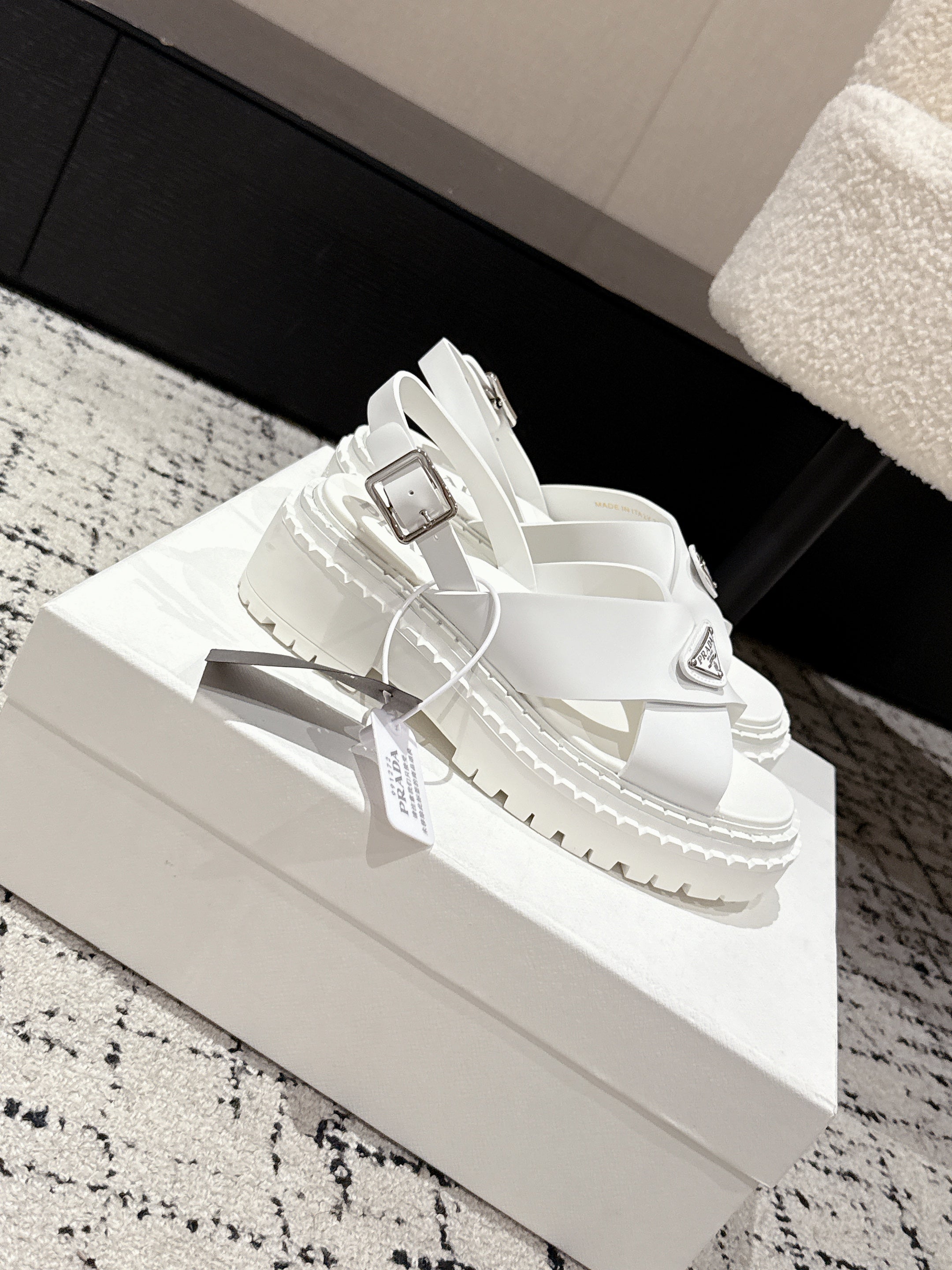 PRADA 25S CRISSCROSS SANDALS IN WHITE CALFSKIN LOGO