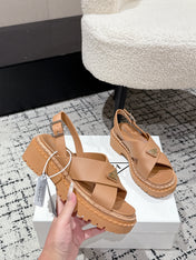PRADA 25S CRISSCROSS SANDALS IN BURNT ORANGE CALFSKIN LOGO