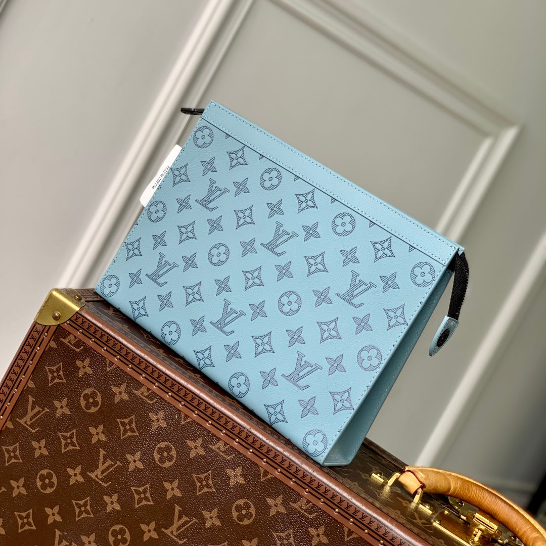 POCHETTE VOYAGE 26 IN SKY BLUE MONOGRAM ECLIPSE CALFSKIN
