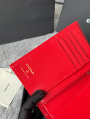 CHANEL 25S MULTI PURPOSE PASSPORT WALLET 15 IN VIVID RED CALFSKIN GOLD HARDWARE