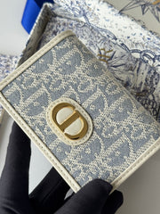 DIOR 25S CARO CARD HOLDER 11 IN LIGHT BLUE CALFSKIN AND CANVAS GOLD HARDWARE