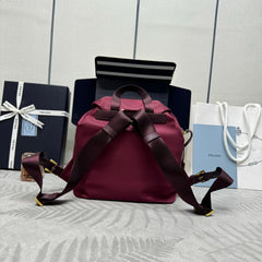 PRADA 25S RE-EDITION 1978 SMALL BACKPACK 28 IN BURGUNDY RE-NYLON