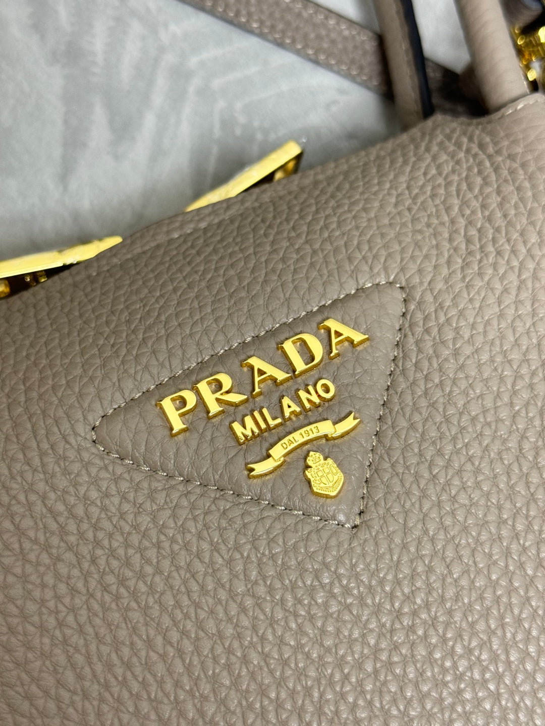 PRADA 25S SMALL BAG 23 IN TAUPE CALFSKIN GOLD HARDWRE