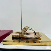 THONG SANDALS IN DARK BEIGE FABRIC PRINTED LOGO WITH GOLD HARDWARE