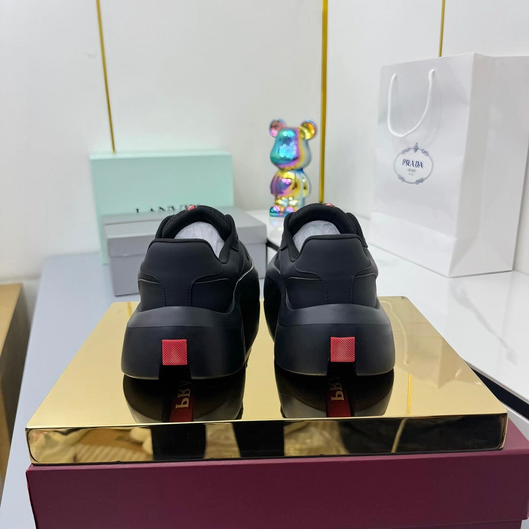 PRADA 25S SNEAKERS IN BLACK CALFSKIN