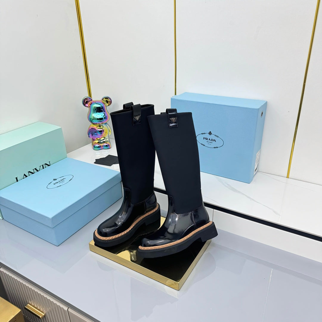 PRADA 25S HIGH BOOTS MARTIN 50MM IN BLACK GLOSSY CALFSKIN WITH LOGO