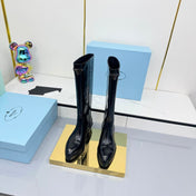 PRADA 25S POINTED TALL BOOTS 50MM IN BLACK GLOSSY CALFSKIN WITH LOGO