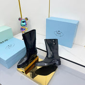 PRADA 25S BROOKLYN BOOTS 50MM IN BLACK GLOSSY CALFSKIN WITH LOGO