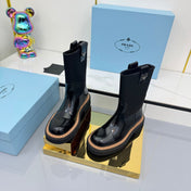 PRADA 25S HIGH MARTIN BOOTS 50MM IN BLACK GLOSSY CALFSKIN
