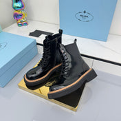 PRADA 25S LONG THICK SOLED MARTIN BOOTS 50MM IN BLACK GLOSSY CALFSKIN